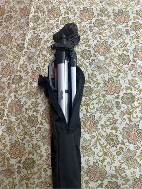 Amazon Essentials Silver and Black Camera Tripod with Carry Sleeve